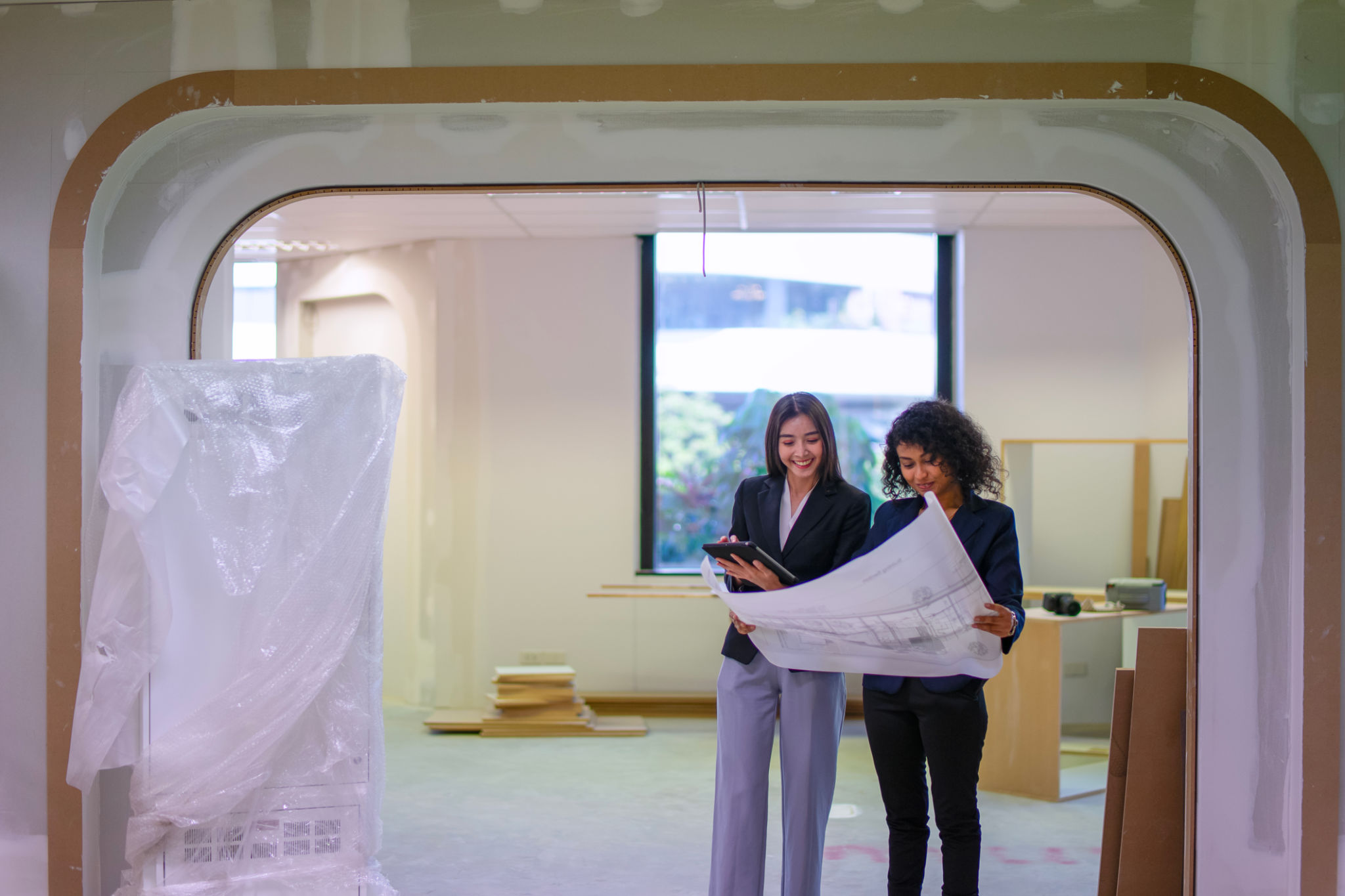 Interior designers meeting at construction site. design, architecture.